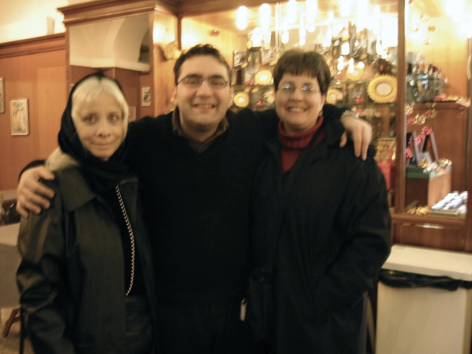 The cute tabacchi guy, Mom, me...